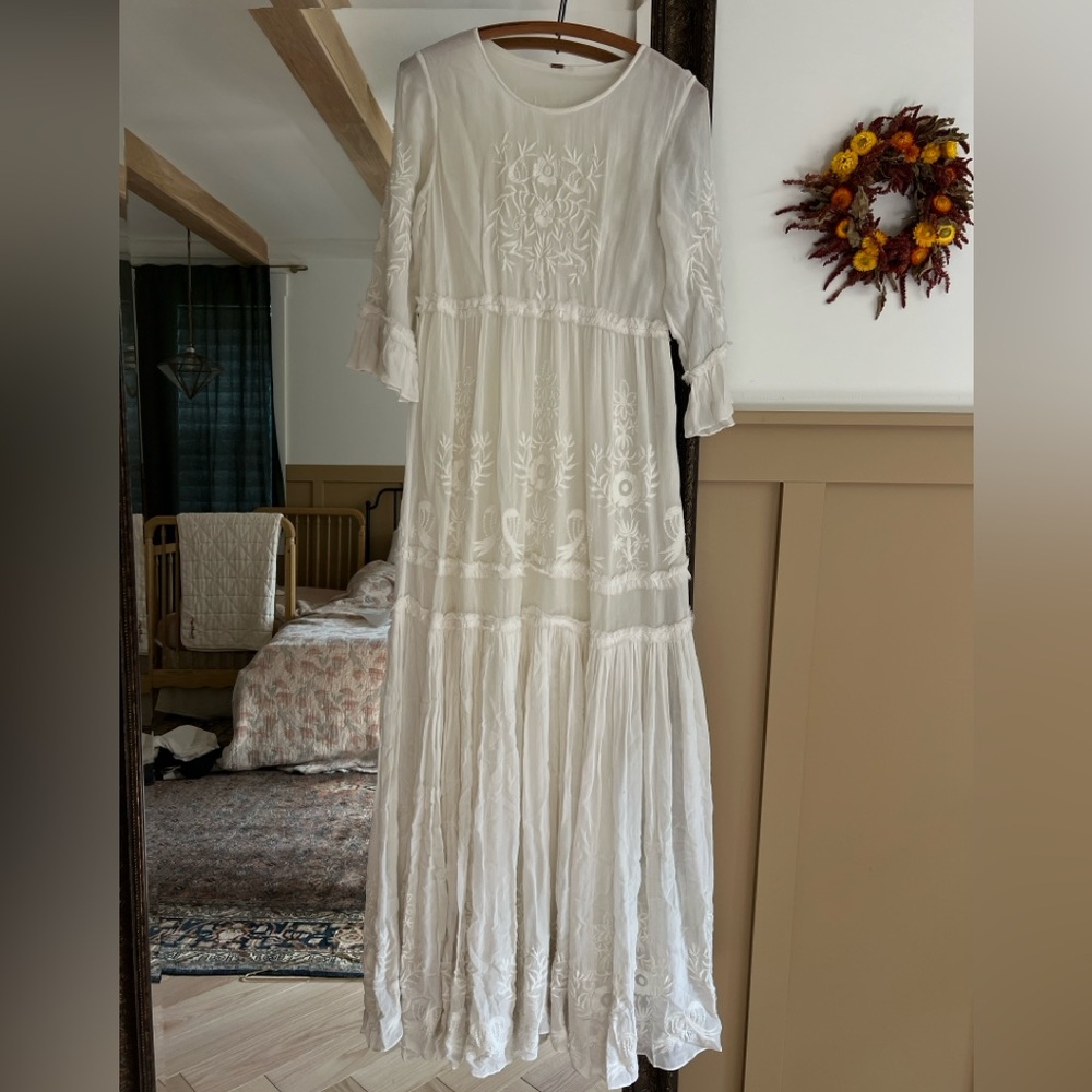 Stunning free people dress. Beautiful detail. Small